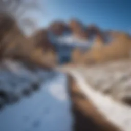 A stunning view of Camelback Mountain covered in snow under a bright blue sky