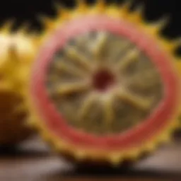 Vibrant yellow dragon fruit sliced open to reveal its unique texture